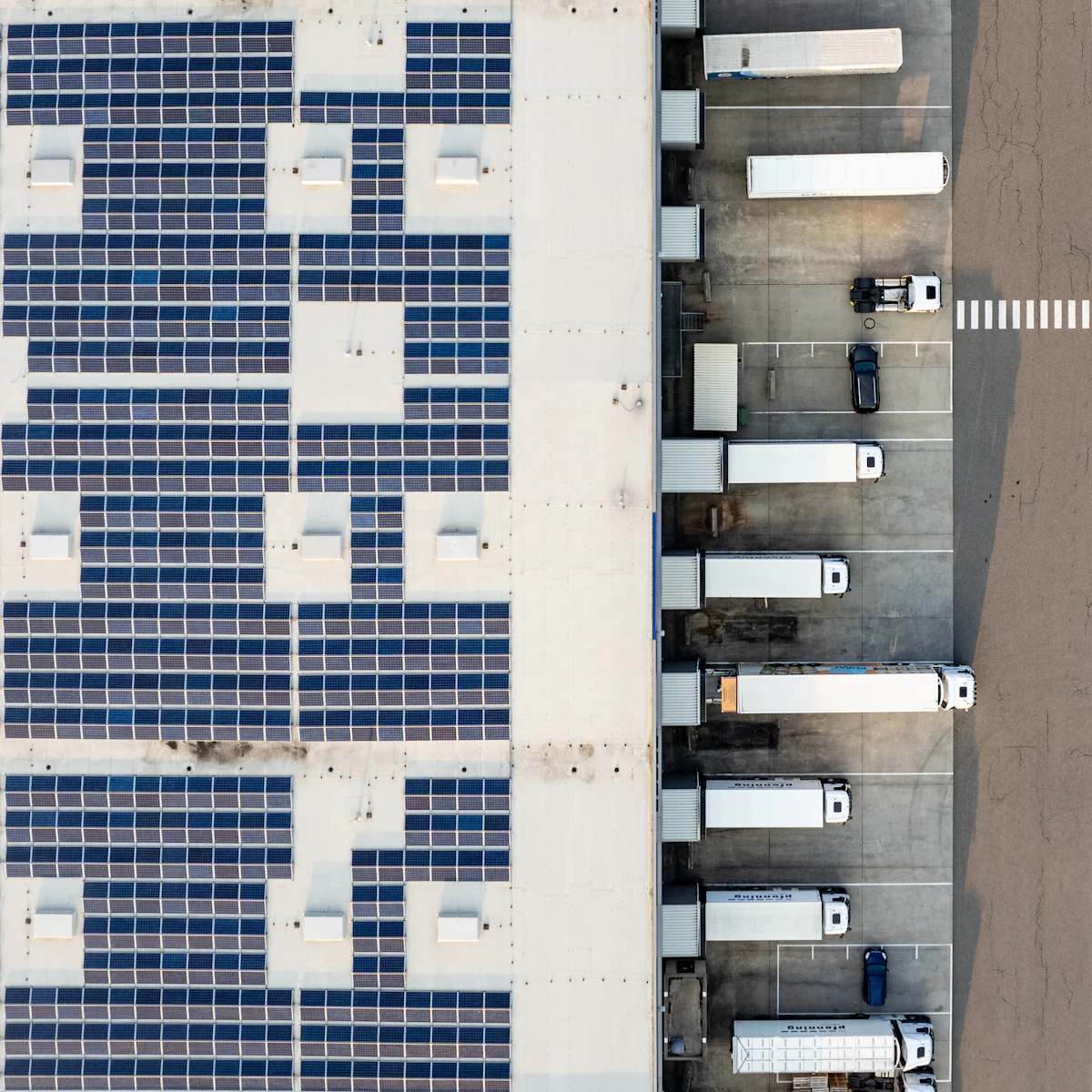 Aerial view of white commercial roofs